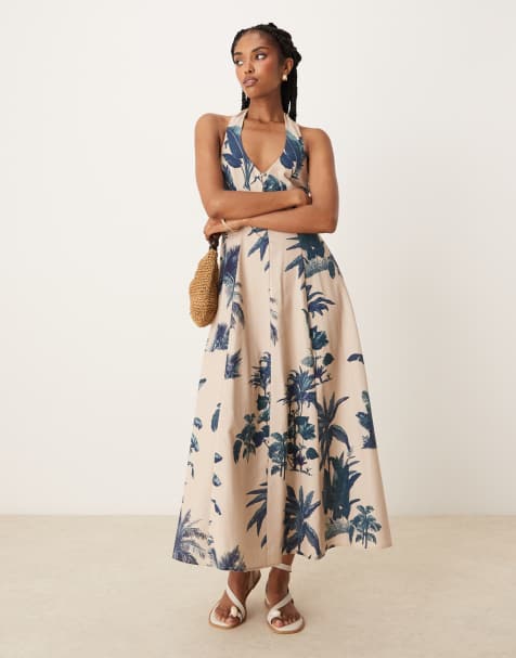 ASOS DESIGN – Palmmönstrad midiklänning med halterneck och klockad kjol - view 1