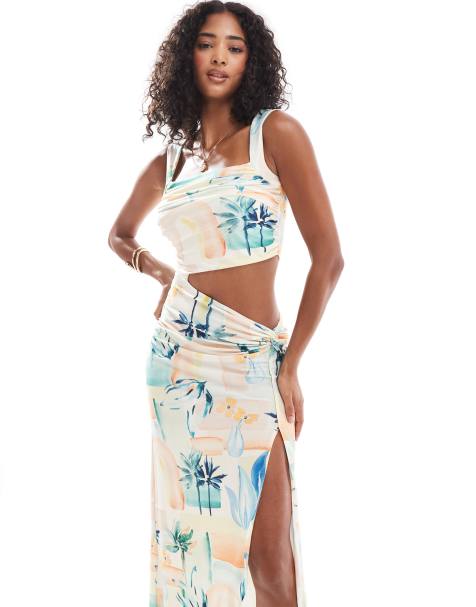 ASOS DESIGN – Palmmönstrad, rynkad midiklänning med knut framtill - view 1