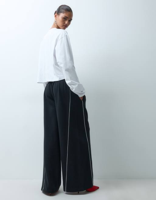ASOS DESIGN panelled extreme wide leg jogger with piping details in black and white, 2 of 5