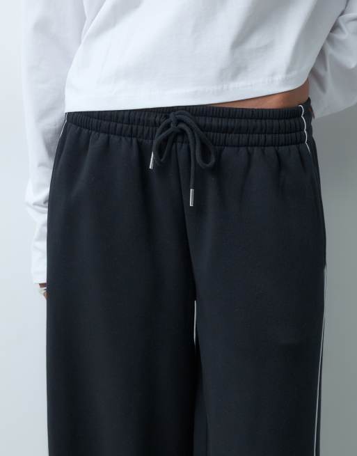 ASOS DESIGN panelled extreme wide leg jogger with piping details in black and white, 4 of 5