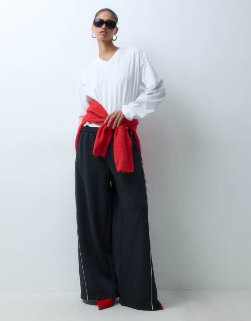 ASOS DESIGN panelled extreme wide leg jogger with piping details in black and white, 5 of 5