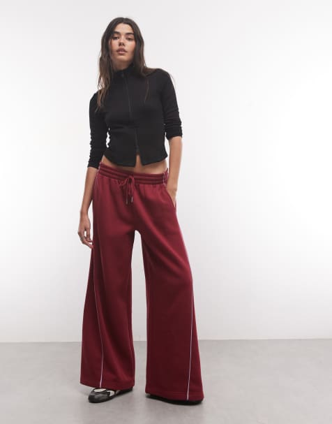 ASOS DESIGN panelled extreme wide leg jogger with piping details in burgundy and lilac - view 1