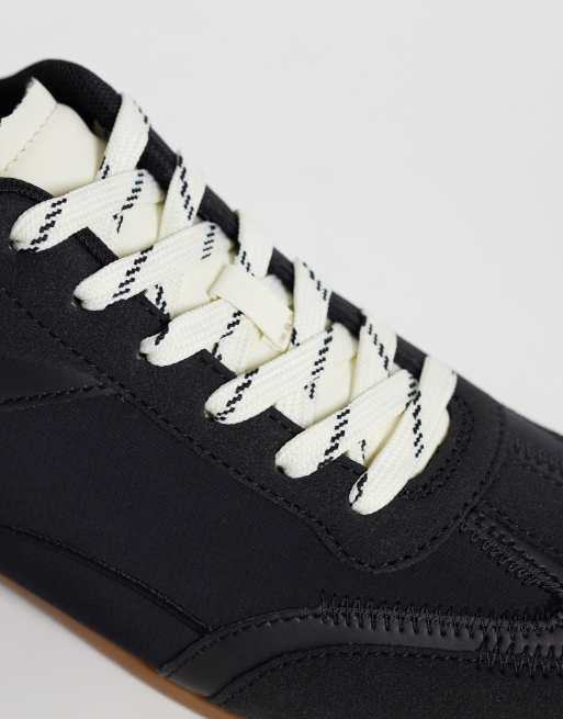 ASOS DESIGN panelled retro sneakers in black, 2 of 5