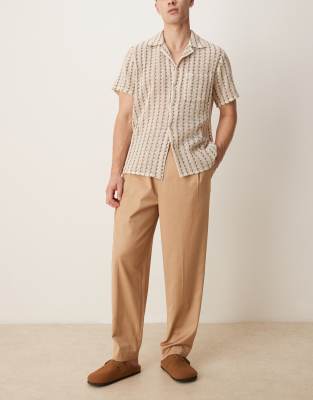 ASOS DESIGN - Pantalon à pinces élégant coupe chino fuselée avec taille élastique - Fauve - view 1