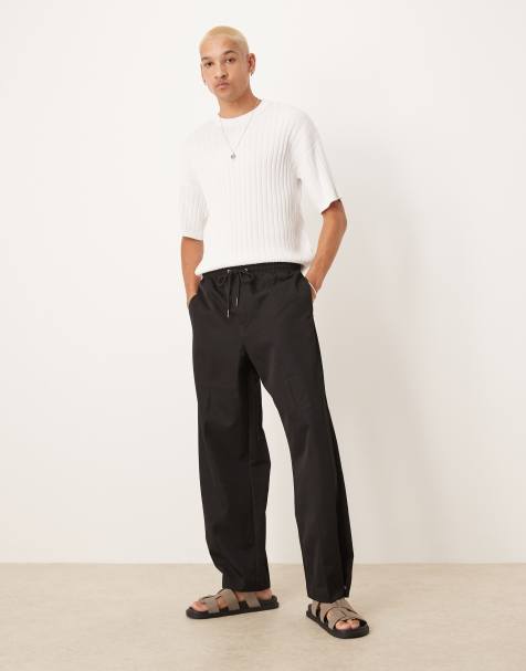 ASOS DESIGN - Pantalon ample élégant à enfiler avec ourlet à boutons-pression - Noir - view 1