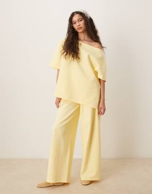 ASOS DESIGN - Pantalon ample en maille interlock - Jaune