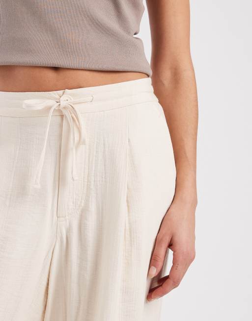 ASOS DESIGN - Pantalon ample en tissu texturé doux au toucher - Crème, 4 de 5