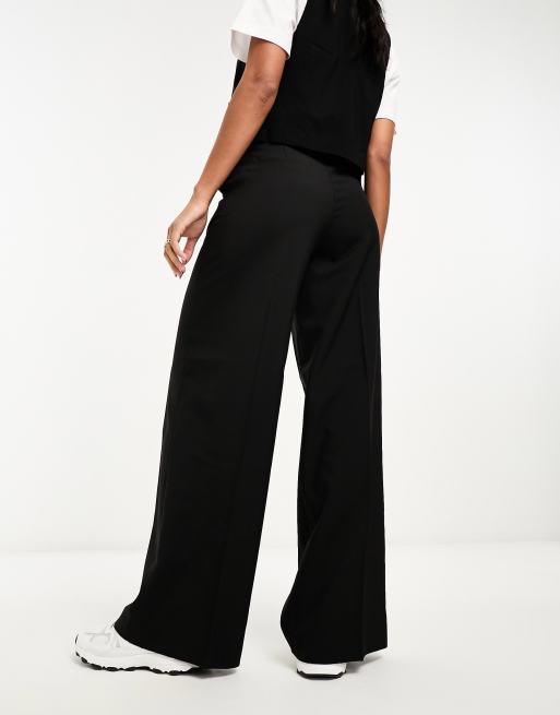 Pantalon noir ample hot sale