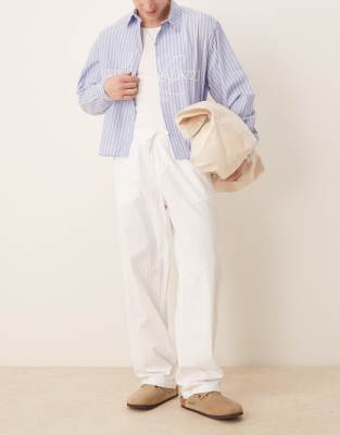 ASOS DESIGN - Pantalon baggy à rayures - Blanc