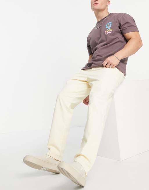 ASOS DESIGN - Pantalon chino décontracté style skateur - Jaune pastel