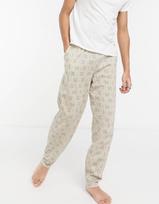 ASOS DESIGN Pantalon confort imprim chiffres romains