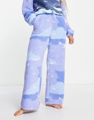 ASOS DESIGN - Pantalon confort ample d'ensemble en polaire douillette à motif paysage - Bleu | ASOS
