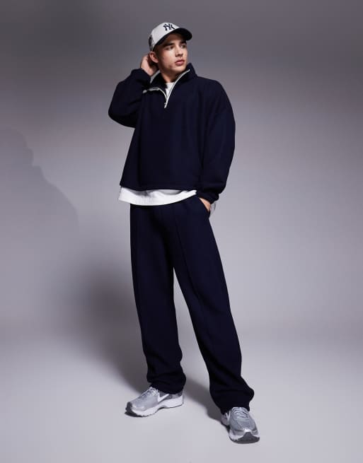 ASOS DESIGN - Pantalon de jogging baggy habillé d'ensemble en tissu gaufré avec nervure devant - Bleu marine gaufré