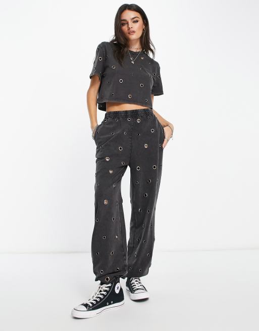 ASOS DESIGN - Pantalon de jogging d'ensemble à œillets - Anthracite délavé 