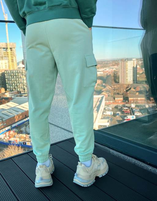 ASOS DESIGN Pantalon de jogging oversize à poches cargo Vert