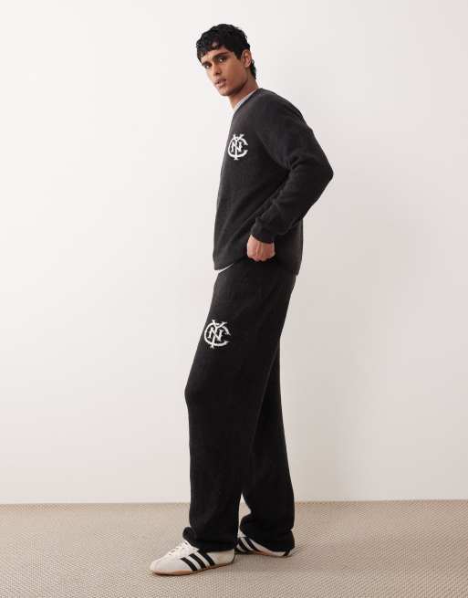 ASOS DESIGN - Pantalon de jogging oversize d'ensemble en maille resserré aux chevilles avec logo NYC - Noir délavé, 3 de 5