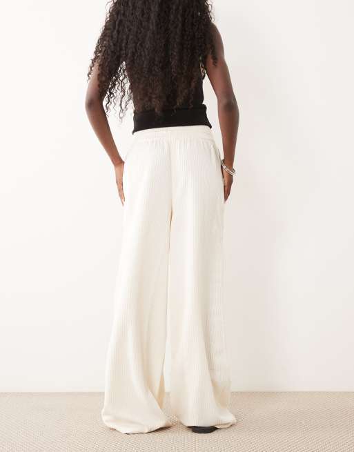 ASOS DESIGN pantalón de pana de pernera ancha de cintura elástica en color 'eggnog', 5 de 5