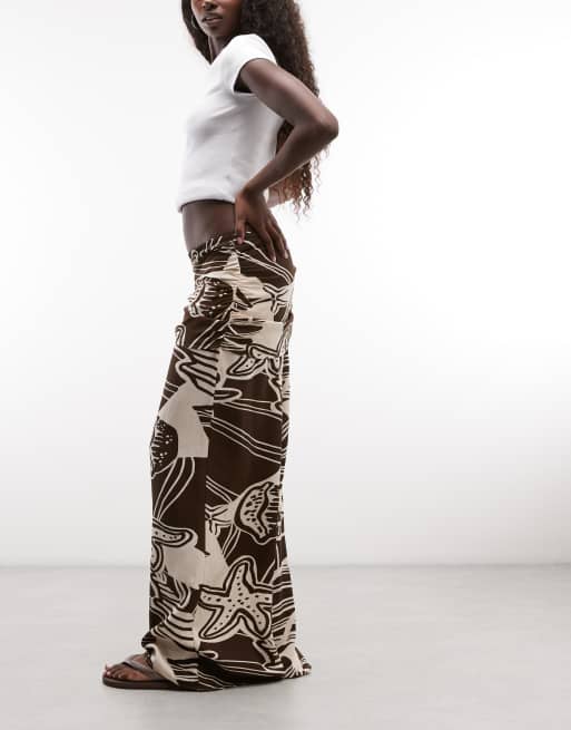 ASOS DESIGN - pantalón de pernera ancha con detalle de pañuelo en estampado de conversación, 2 de 5