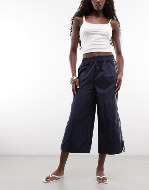 ASOS DESIGN - Pantalon de survêtement court avec passepoil écru - Bleu marine - view 1