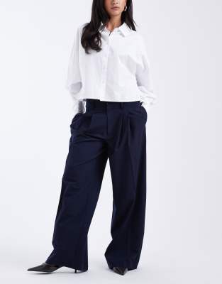 ASOS DESIGN - Pantalon de tailleur ample à taille basse asymétrique - Bleu marine