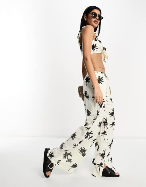 ASOS DESIGN - Pantalon d'ensemble à enfiler en gaze de coton à imprimé palmier