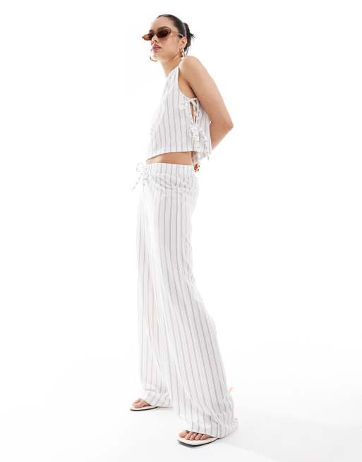 ASOS DESIGN - Pantalon d'ensemble ample à rayures et taille basse