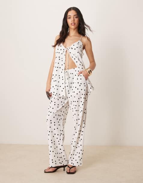 ASOS DESIGN - Pantalon d'ensemble évasé à enfiler à pois texturés - Blanc - view 1