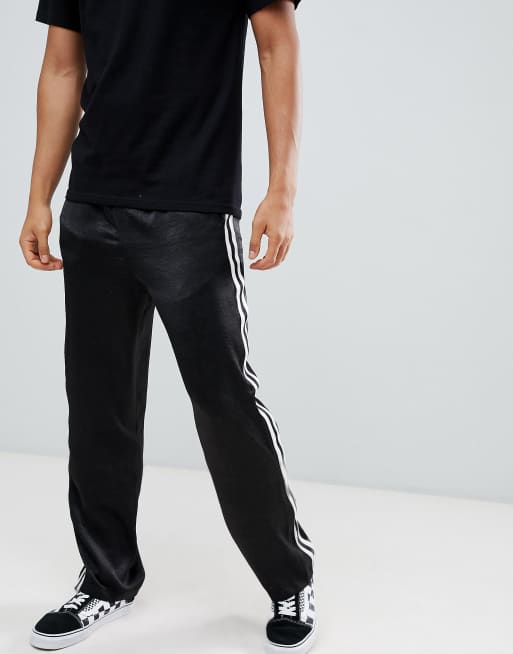 Pantalon noir bande blanche homme new arrivals