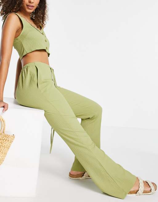 ASOS DESIGN - Pantalon évasé style froissé avec liens à la taille (pièce d’ensemble) - Vert