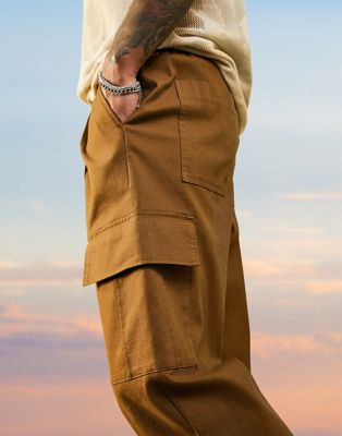 Homme Pantalon large avec poches cargo en tissu texturé
