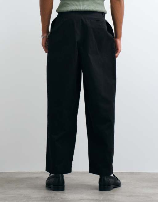 ASOS DESIGN - pantalón oversize tapered negro con triple pliegue, 4 de 5