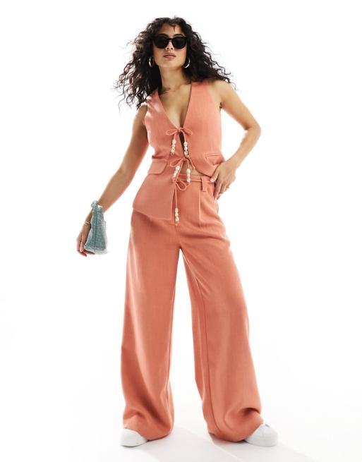 ASOS DESIGN - Pantalon texturé ajusté avec liens à perles - Rouille