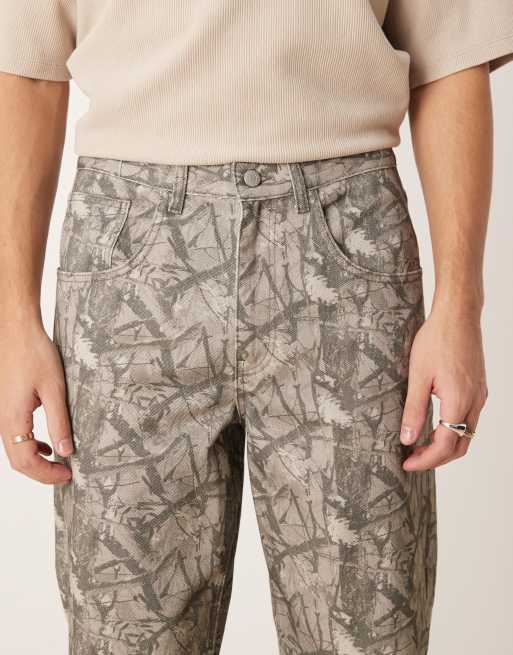 Pantalon ceinturé avec imprimé camouflage shop