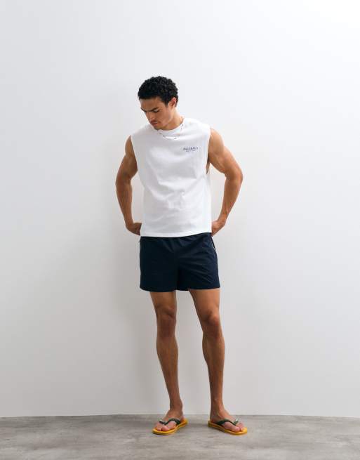 ASOS DESIGN - Pantaloncini ampi lunghezza media elasticizzati in nylon blu navy con profili a contrasto, 4 di 9