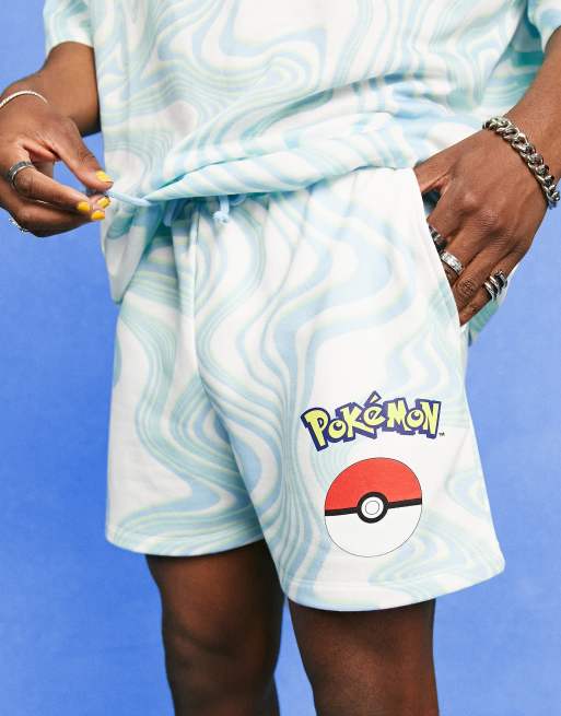 ASOS DESIGN - Pantaloncini blu con motivo stampato Pokémon in coordinato, 3 di 4