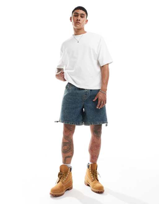ASOS DESIGN - Pantaloncini cargo di jeans taglio medio lavaggio blu medio