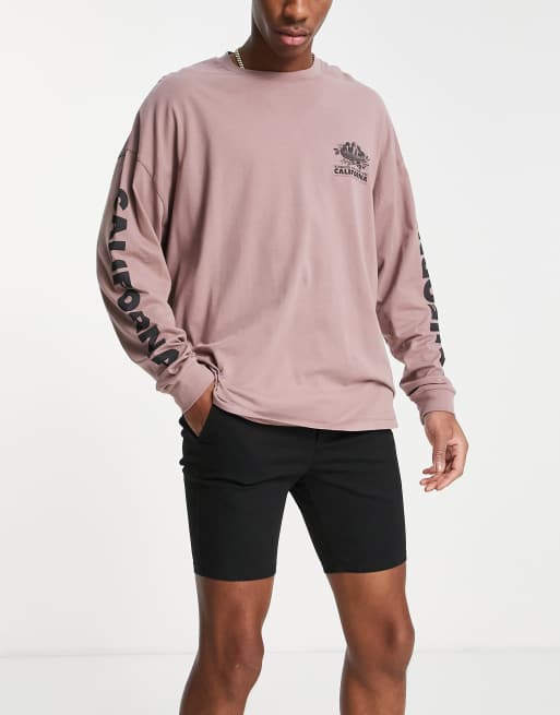 ASOS DESIGN - Pantaloncini chino con pinces neri power stretch lunghezza media 