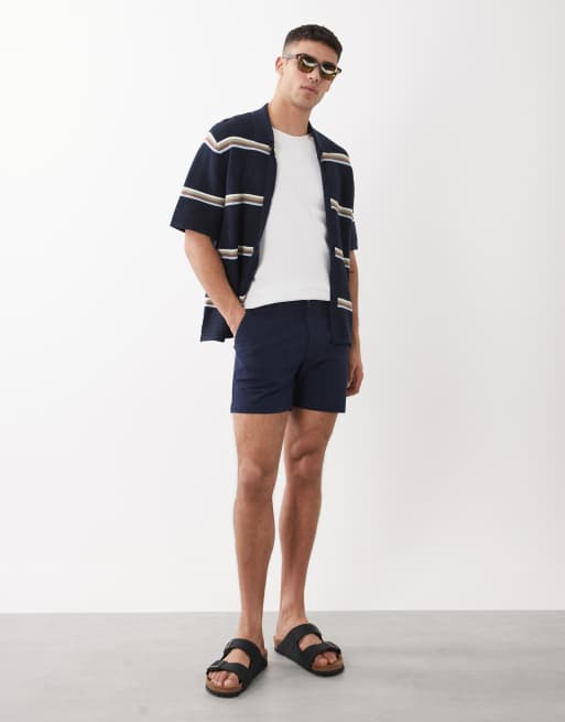 ASOS DESIGN - Pantaloncini chino skinny taglio corto blu navy