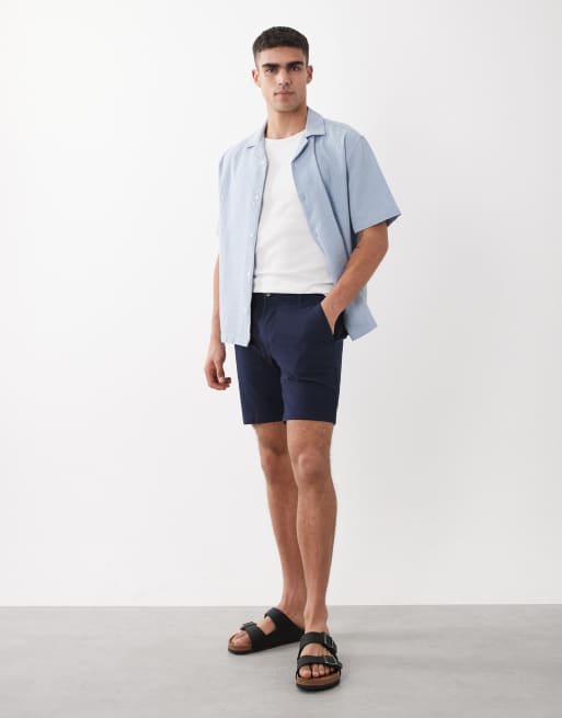 ASOS DESIGN - Pantaloncini chino skinny taglio medio blu navy