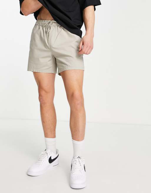 ASOS DESIGN - Pantaloncini chino slim taglio corto beige con vita elasticizzata 
