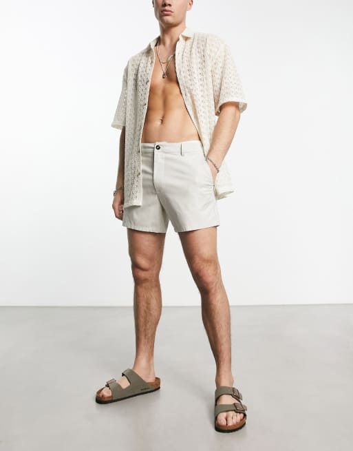 ASOS DESIGN - Pantaloncini chino slim taglio corto beige