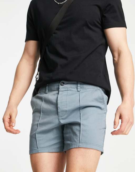 ASOS DESIGN - Pantaloncini chino slim taglio corto blu con pinces 