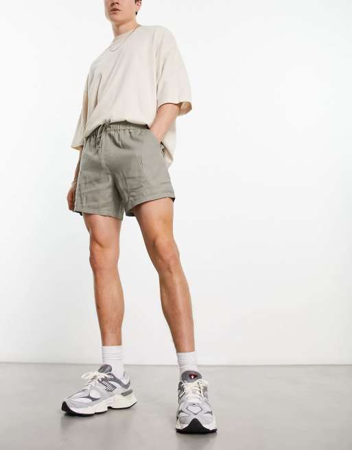 ASOS DESIGN - Pantaloncini chino slim taglio corto in lino verde chiaro 