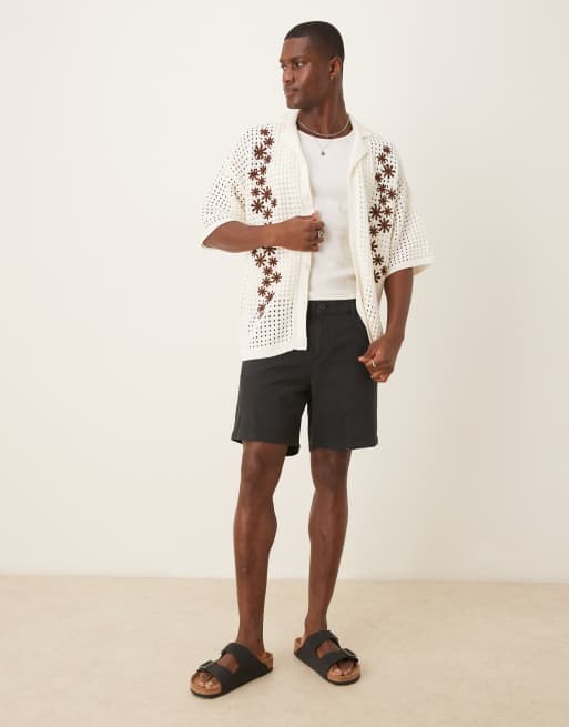 ASOS DESIGN - Pantaloncini chino taglio medio neri