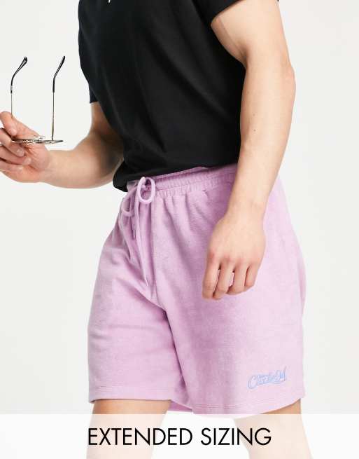 ASOS DESIGN - Pantaloncini comodi in spugna viola con scritta ricamata
