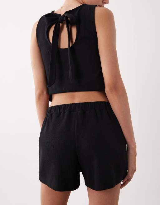 ASOS DESIGN - Pantaloncini comodi neri testurizzati a nido d'ape con coulisse in coordinato, 5 di 5