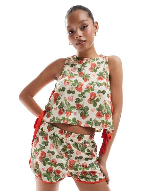 ASOS DESIGN - Pantaloncini con stampa di frutta e bordi a contrasto in coordinato