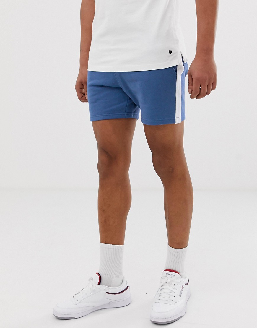 ASOS DESIGN - Pantaloncini corti skinny in jersey blu con riga laterale