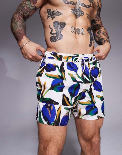 ASOS DESIGN - Pantaloncini da bagno bianchi taglio corto con stampa a fiori