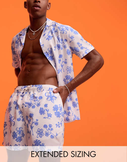 ASOS DESIGN - Pantaloncini da bagno corti con stampa a fiori in coordinato